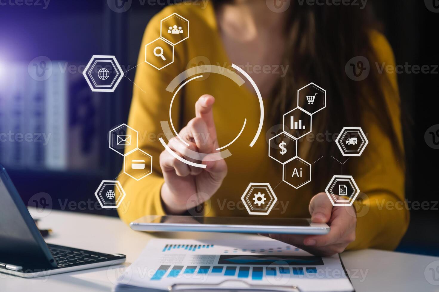 Businesswoman hand working digital marketing media in virtual screen with mobile phone and modern compute with VR icon diagram at office photo