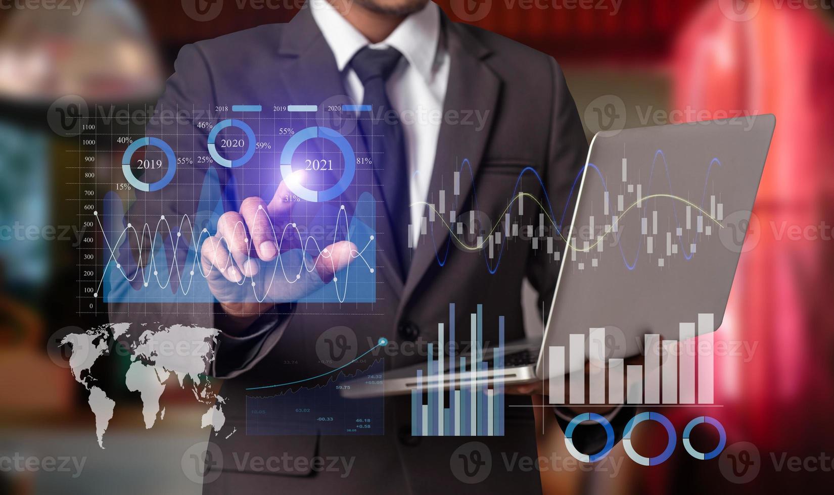 Digital marketing media in virtual screen.business man hand working on laptop computer with digital layer photo