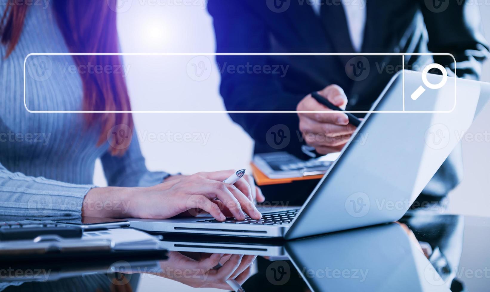 Searching Browsing Internet Data Information Networking Concept with blank search bar.businessman working with mobile phone and laptop computer photo