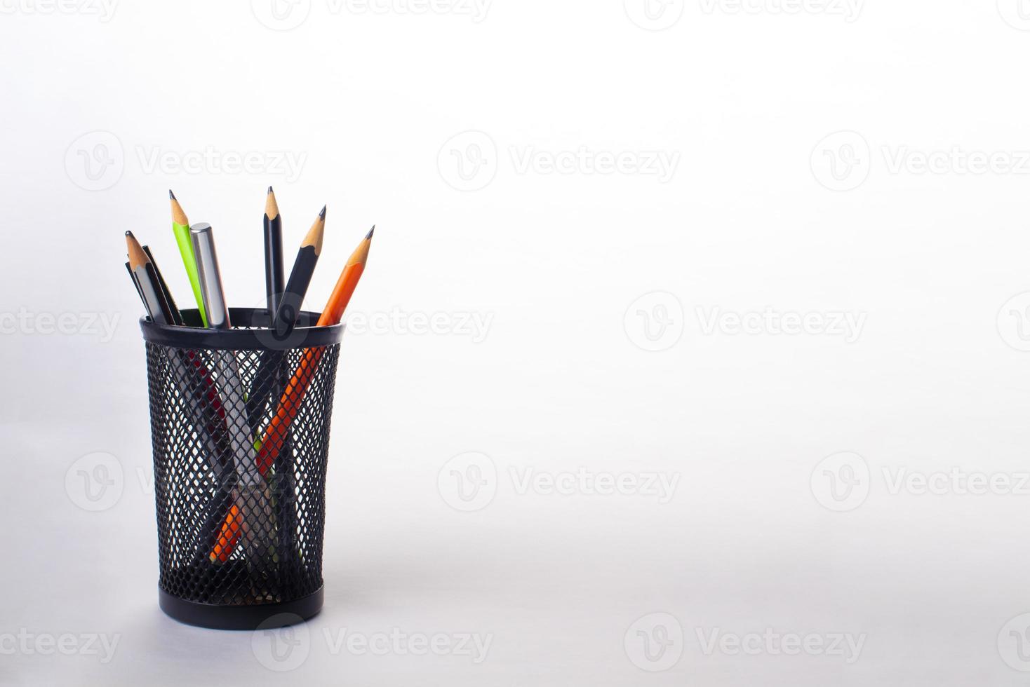 pencils in black pencil holder photo