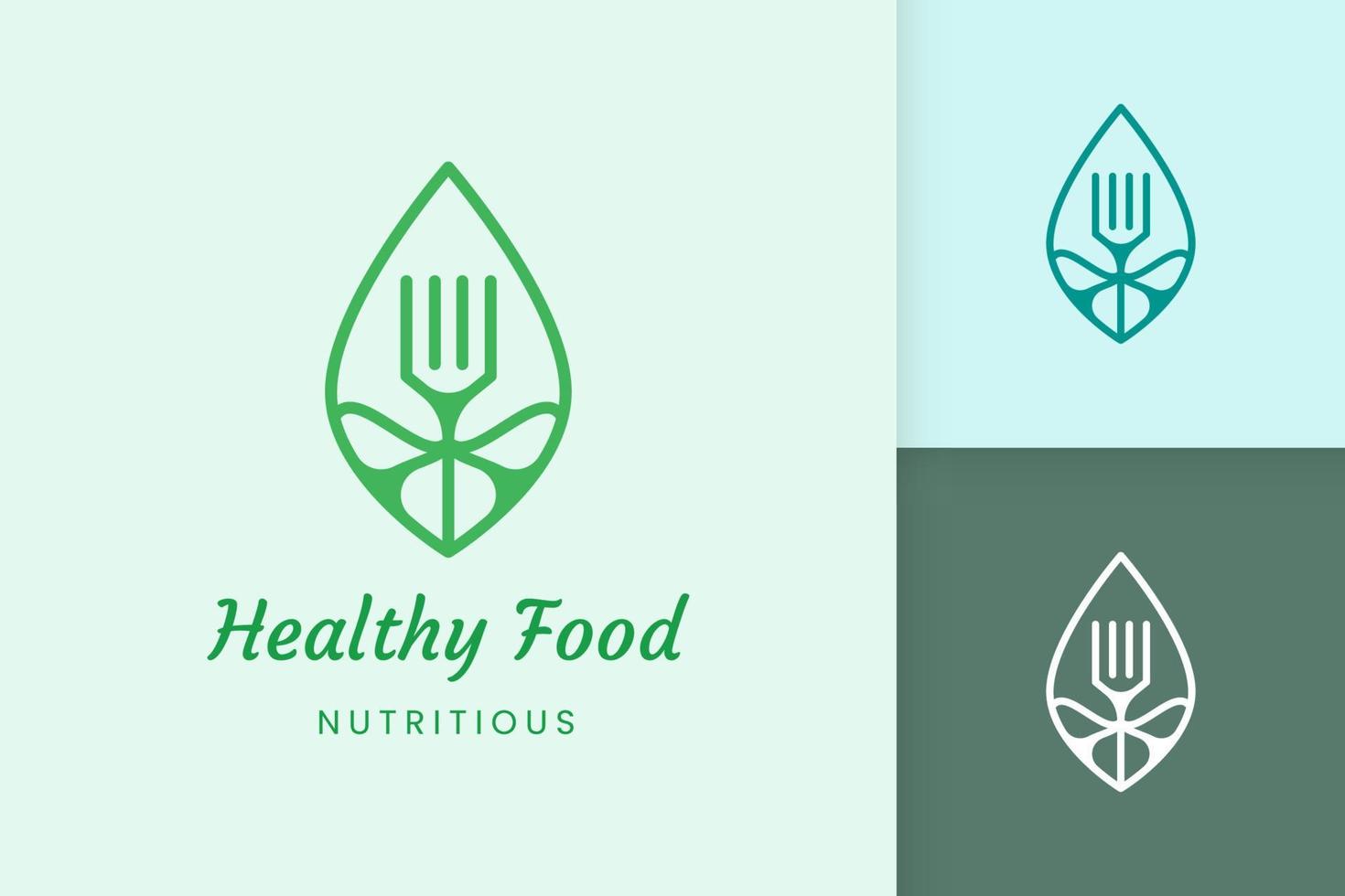 healthy food logo with fork and leaf shape vector