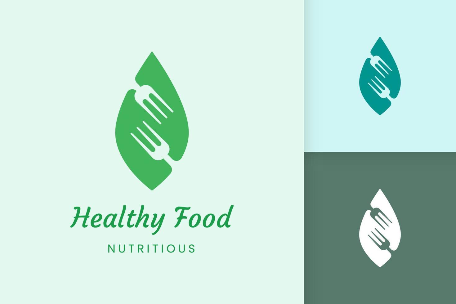 healthy food logo with fork and leaf shape vector