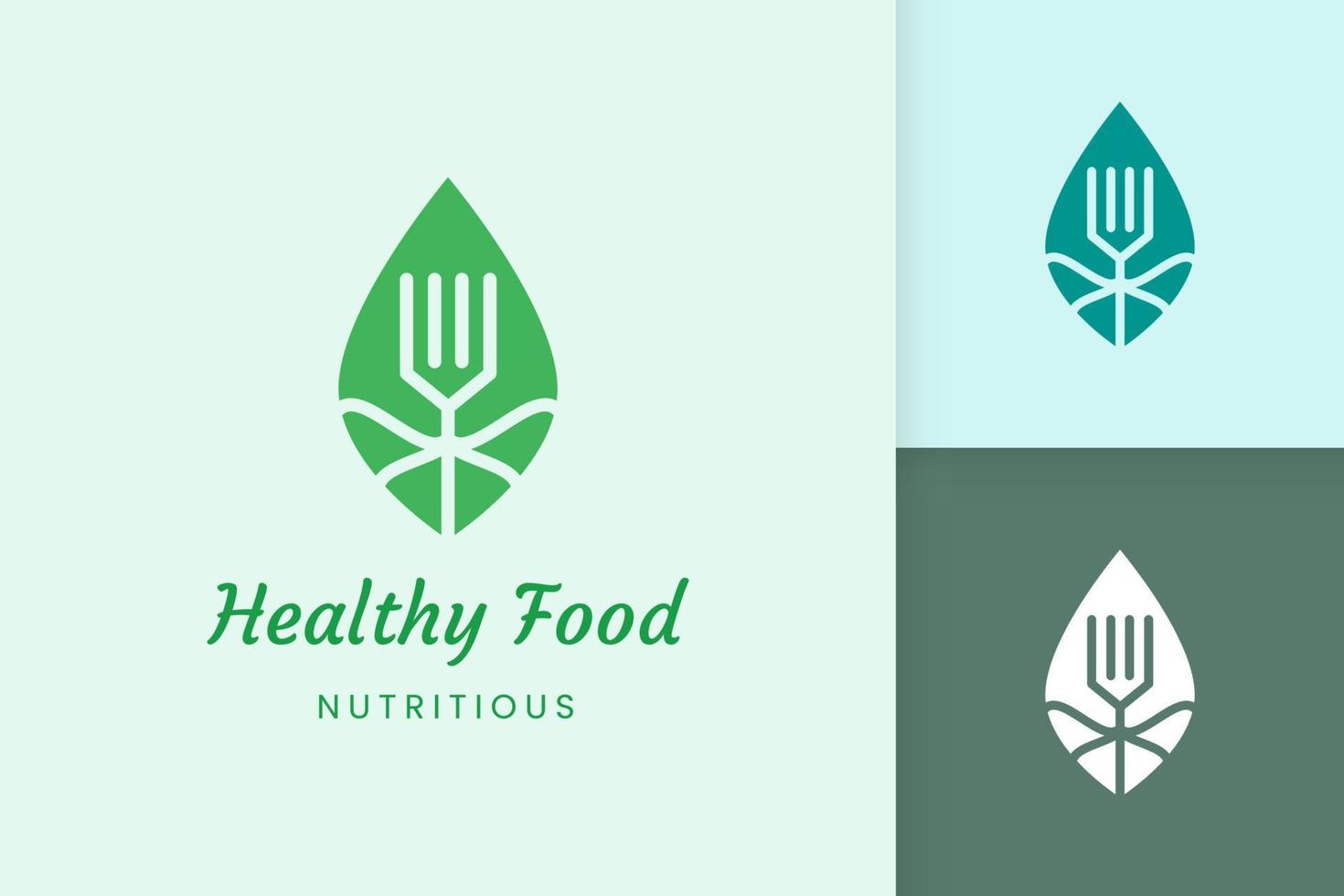 healthy food logo with fork and leaf shape vector