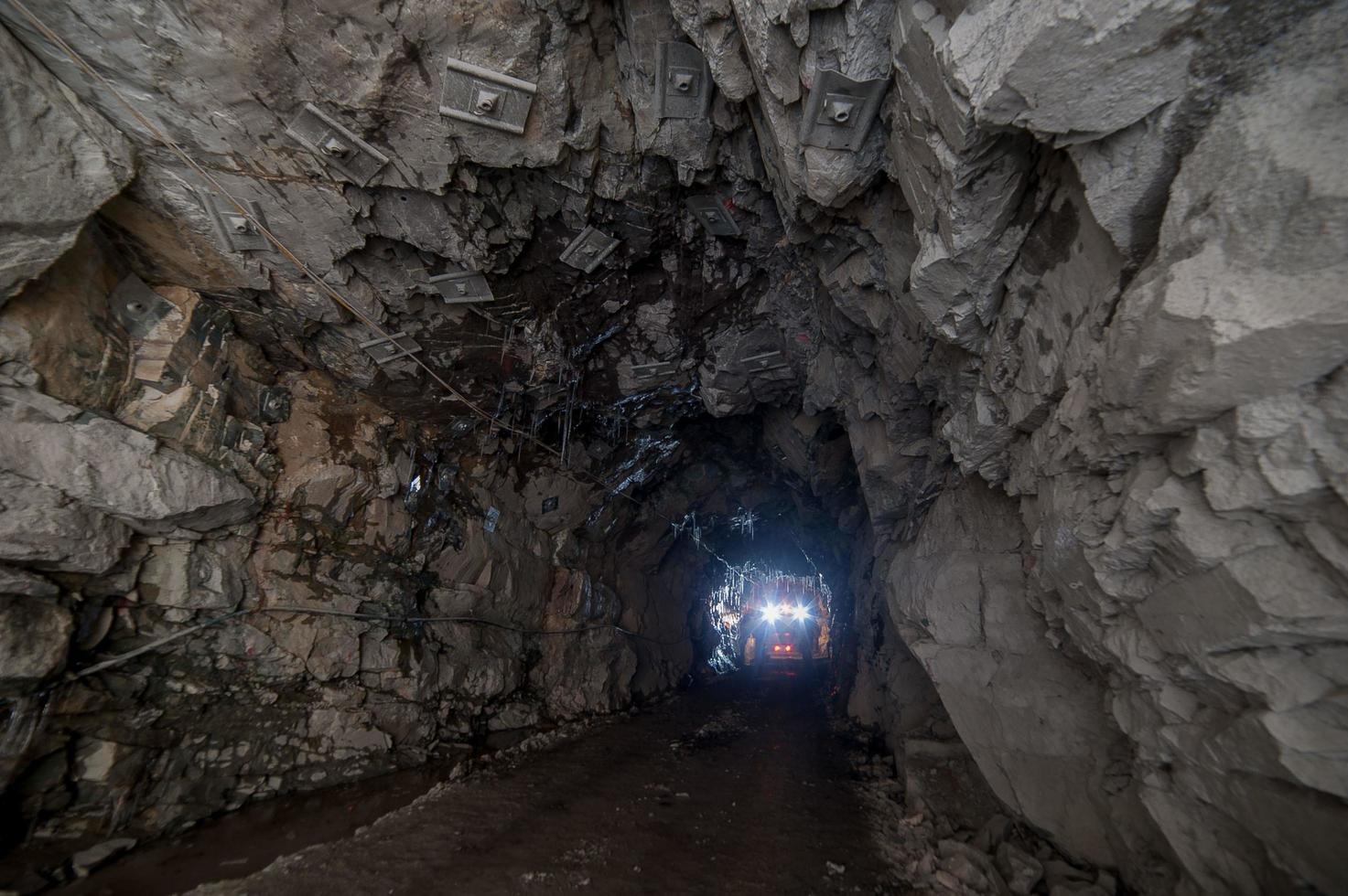 Abandoned mine with transporter cart photo