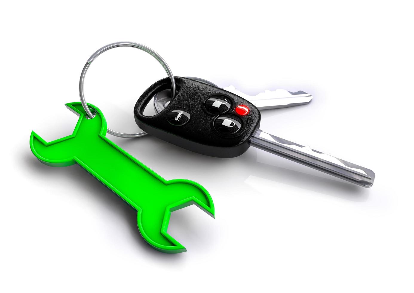 Car keys with green spanner icon as keyring. Car service and repair. photo