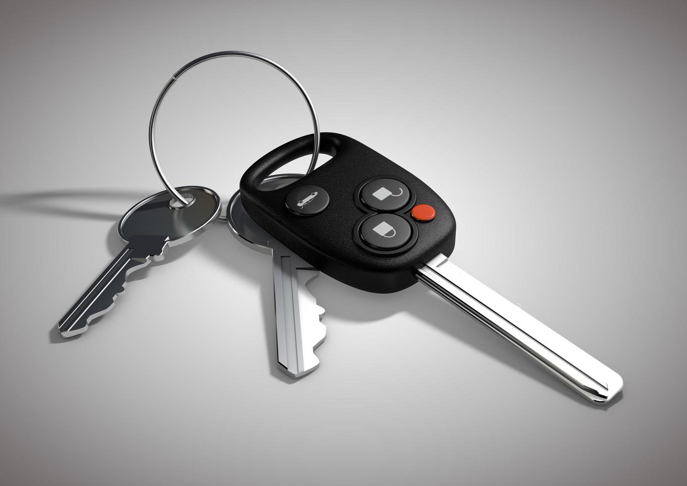 Modern Car keys for passenger vehicle isolated on flat white surface. photo