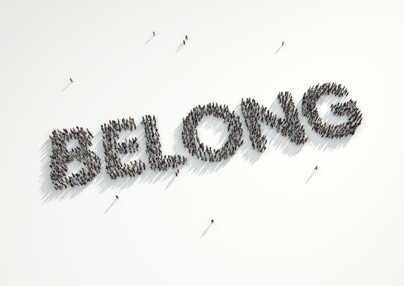 Aerial shot of a crowd of people forming the word 'Belong'. Concept for how people feel like they belong if they conform and follow the crowd and refrain from being an individual. photo