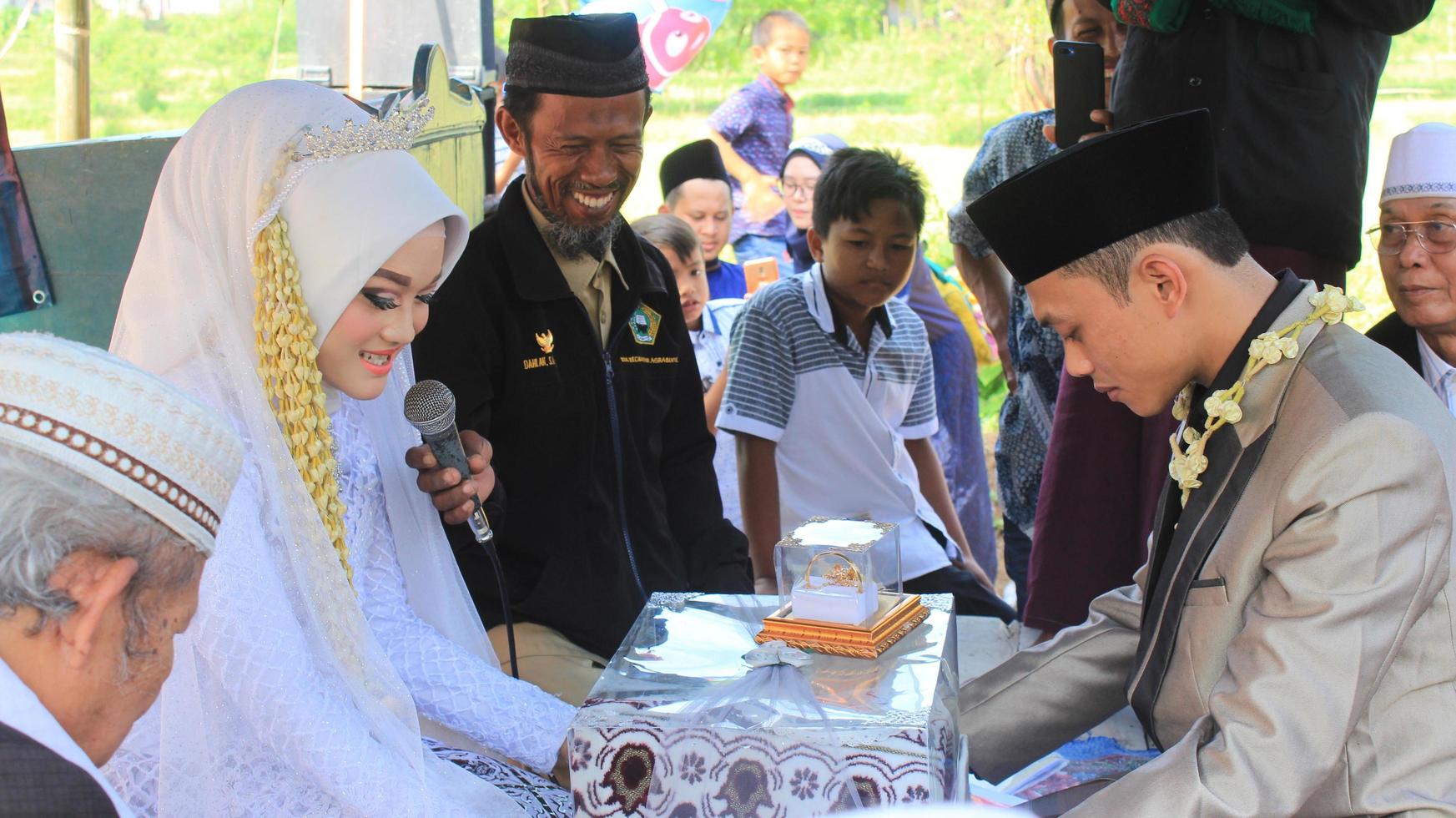 Cianjur Regency, West Java, Indonesia on June 12, 2021, Delivery of the dowry from the groom to the bride. Islamic wedding culture in Indonesia. photo