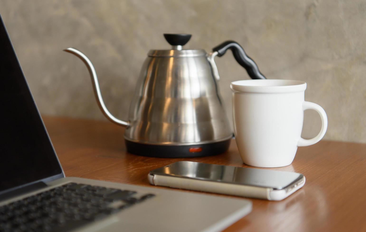 White coffee cup that makes coffee lovers happy to drink coffee photo