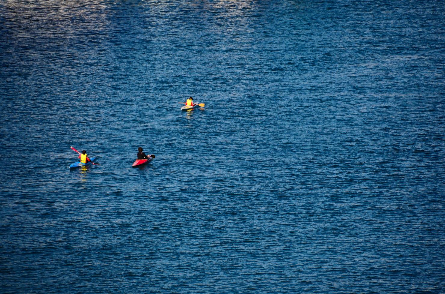 canoeists in the sea savona photo