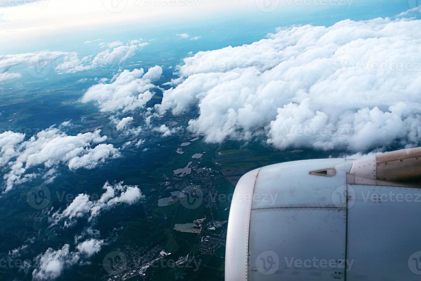 beautiful amazing view to the land and sky from the aircraft photo