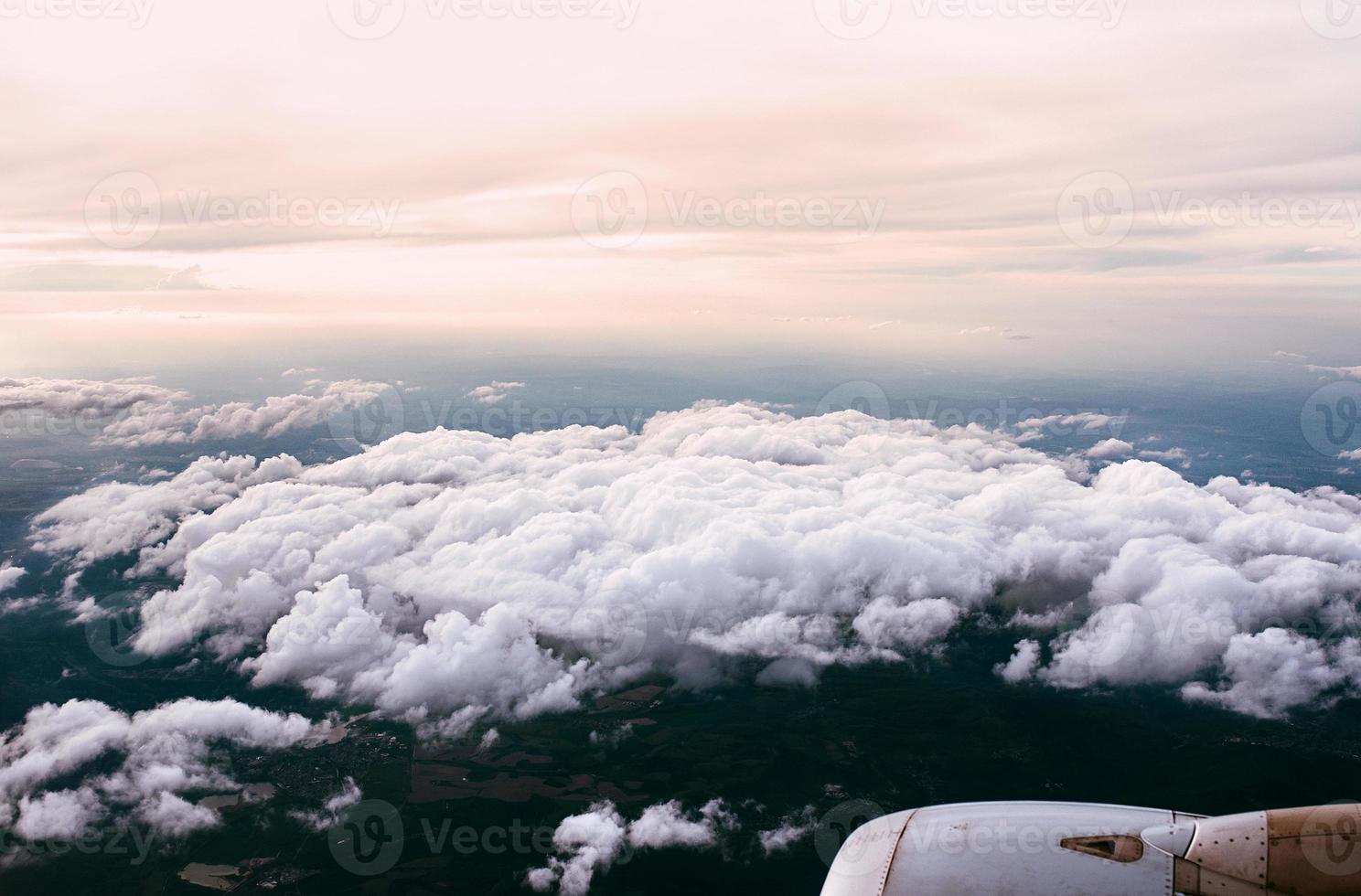 beautiful amazing view to the land and sky from the aircraft photo