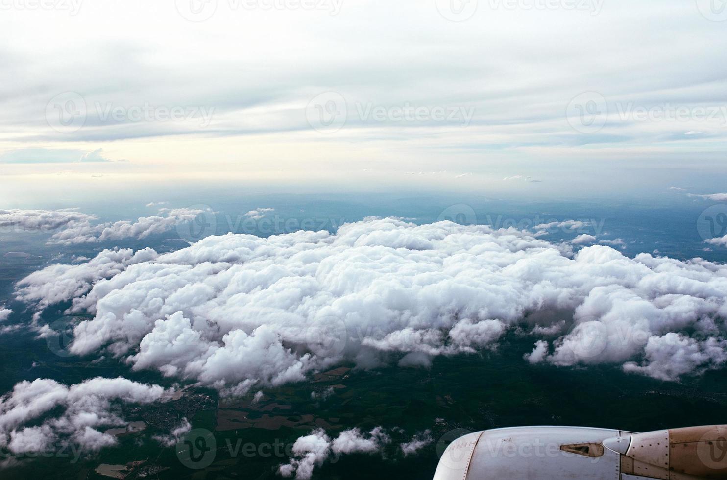 beautiful amazing view to the land and sky from the aircraft photo