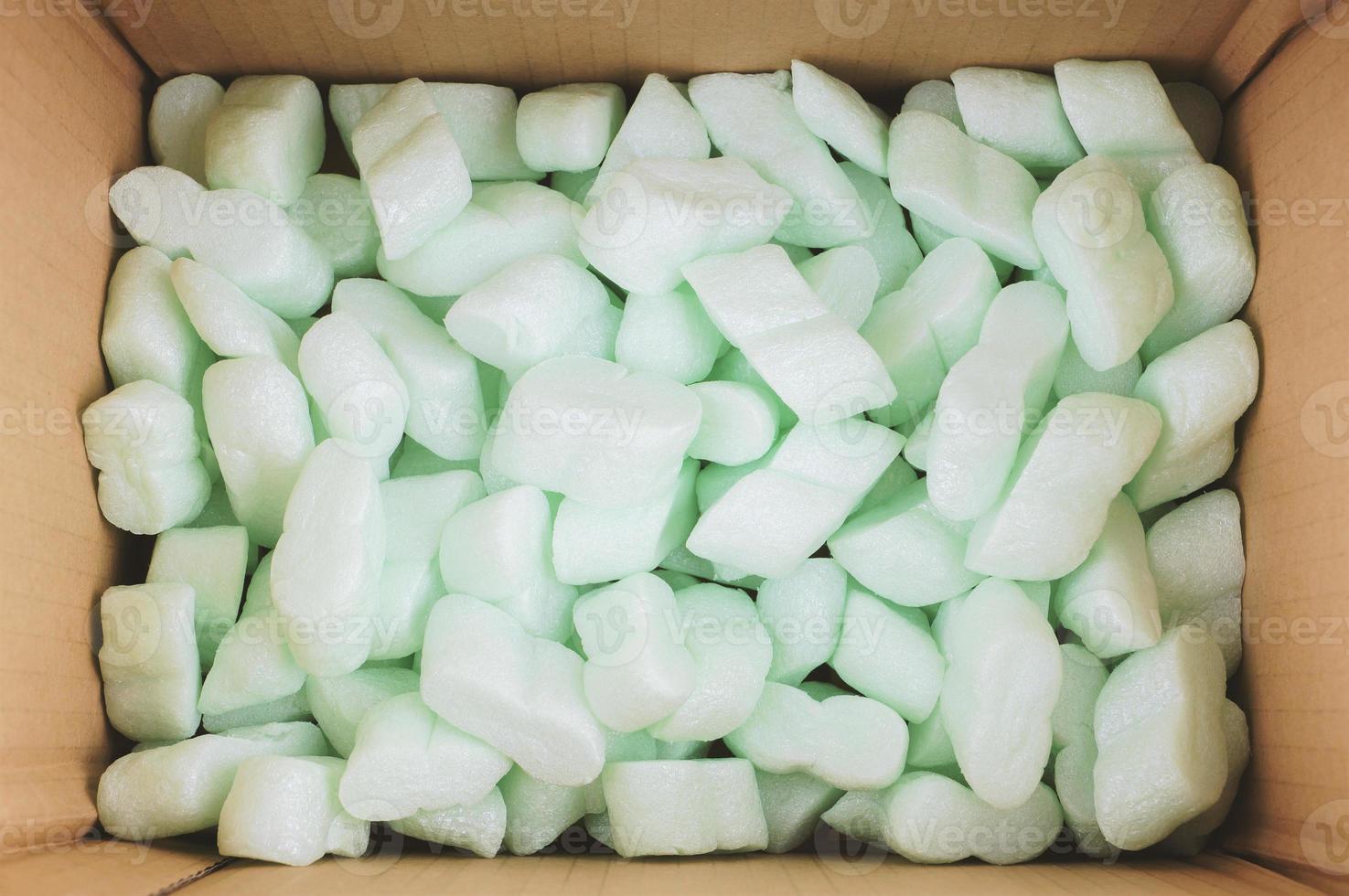 box filled with polystyrene foam peanuts packaging filler cushioning material photo