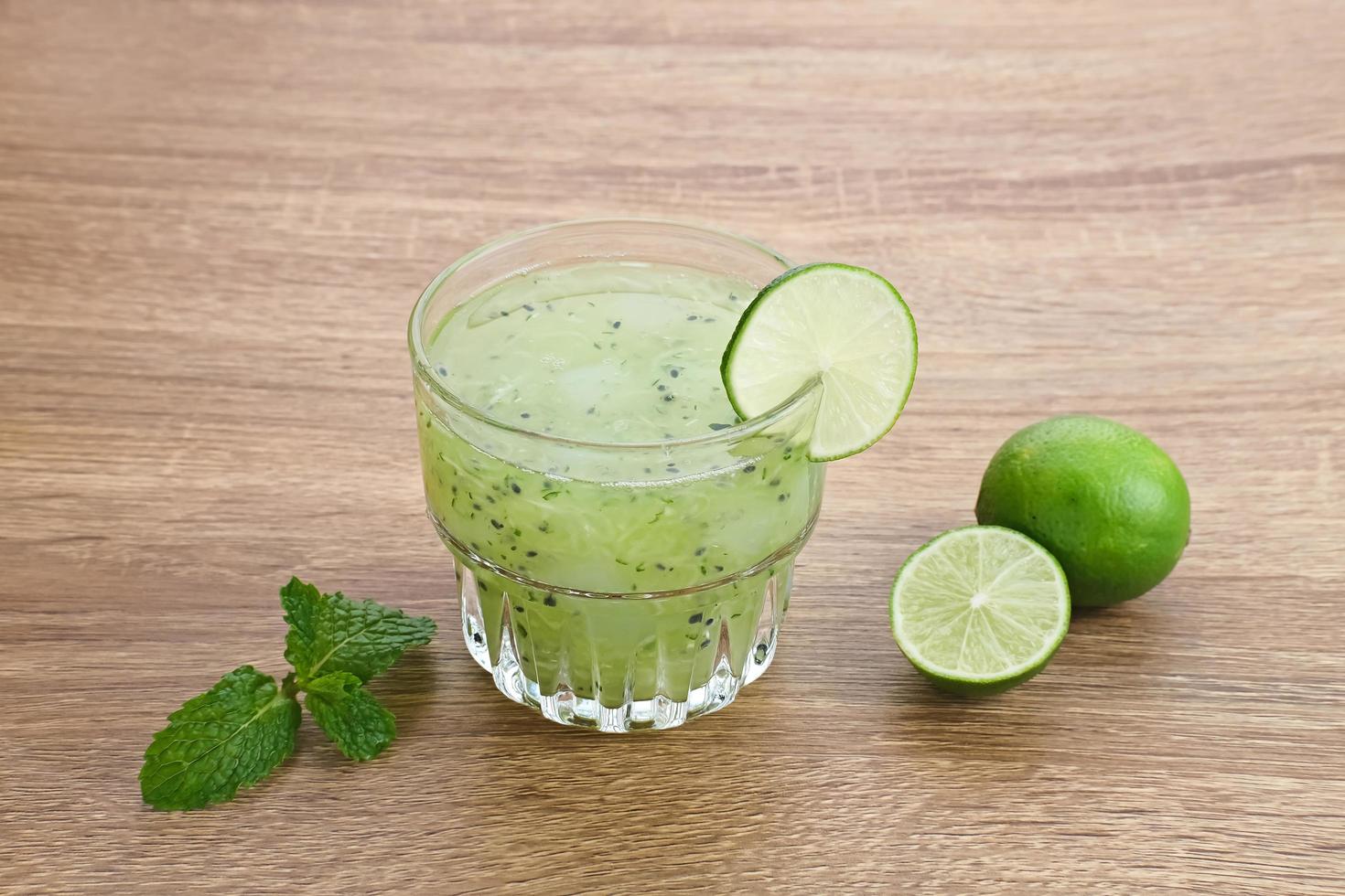 Es Timun Serut, a typical Indonesian drink made from shaved cucumber with syrup, lime and basil seeds. Popular during ramadan. photo