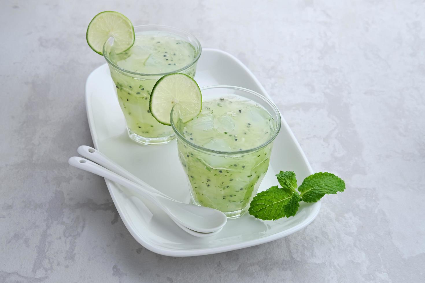 Es Timun Serut, a typical Indonesian drink made from shaved cucumber with syrup, lime and basil seeds. Popular during ramadan. photo