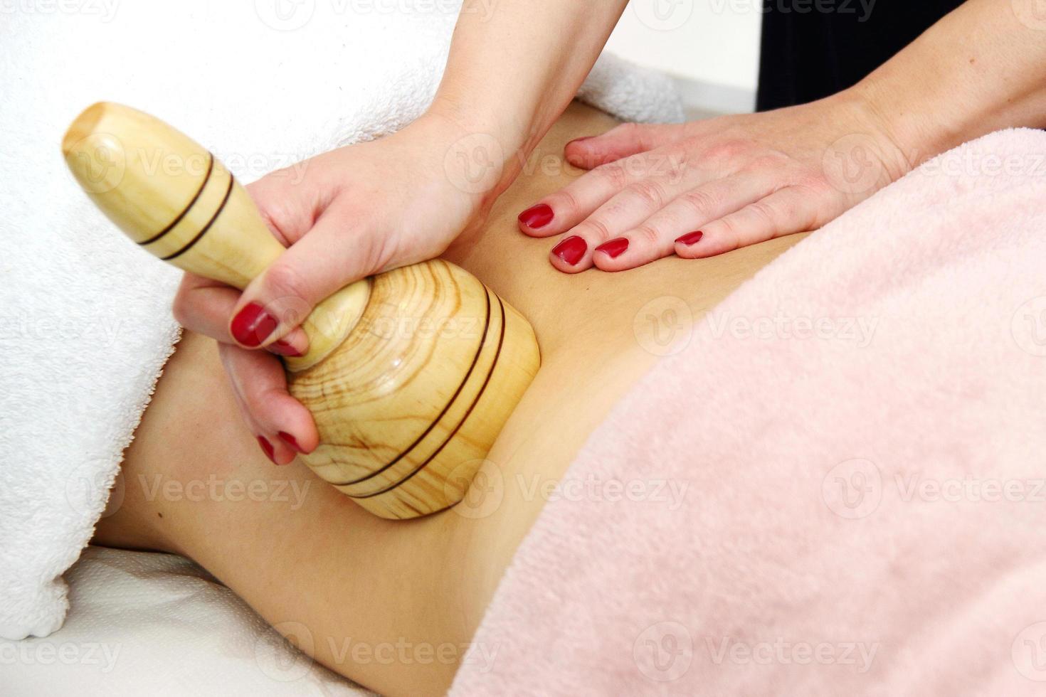 Wooden cup massage,maderotherapy in salon photo