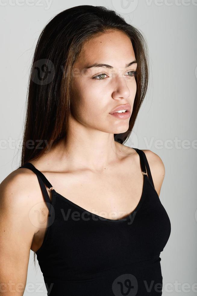 Beautiful young woman without make-up on white background photo