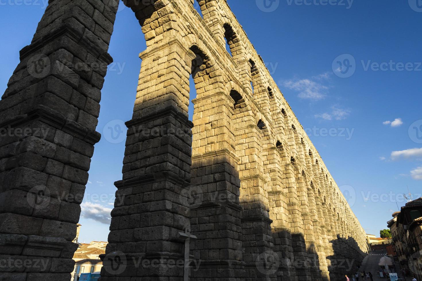 View of the famous Aqueduct of Segovia with beautiful shadow photo