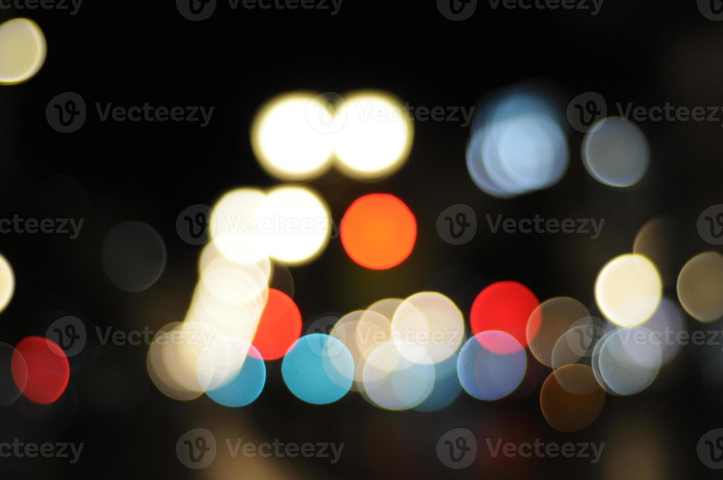 Glitter bokeh lights defocused background photo