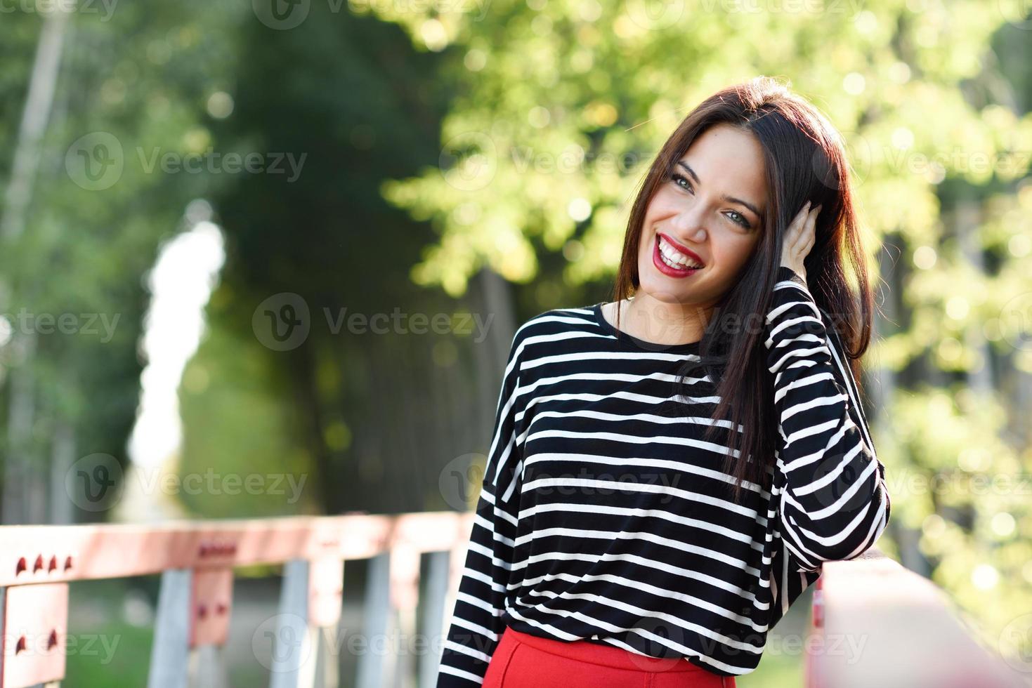 Young woman with green eyes wearing young clothing photo
