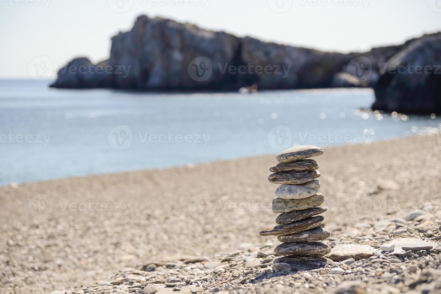 Pebbles in balancing on the beach photo