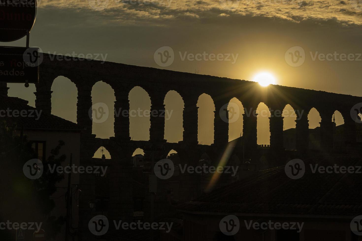 View of the famous Aqueduct of Segovia at Sunset. photo