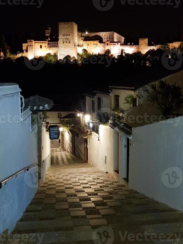 Night view of the famous Alhambra palace in Granada from Albaicin quarter, photo