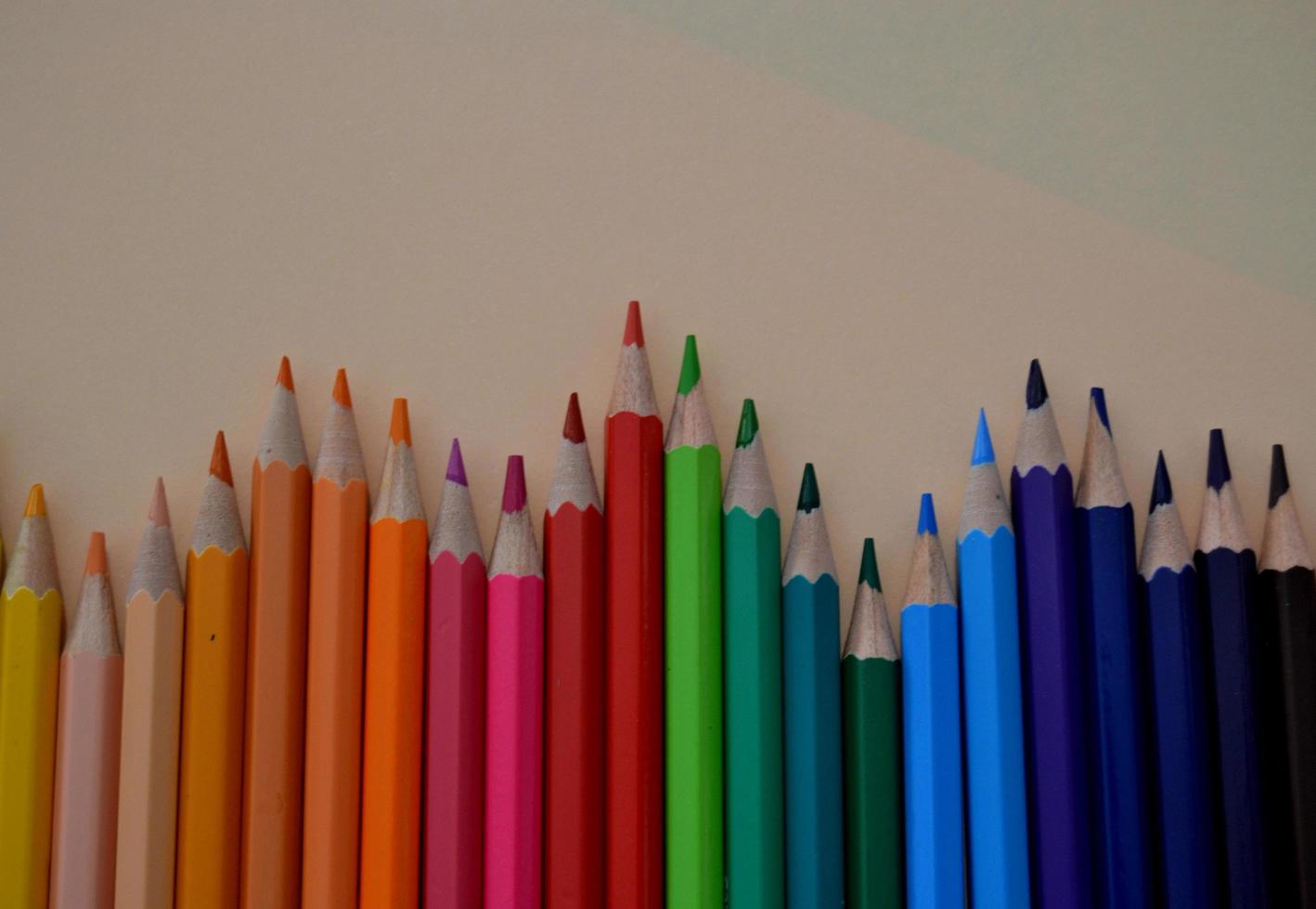 Colored pencils forming a curve photo