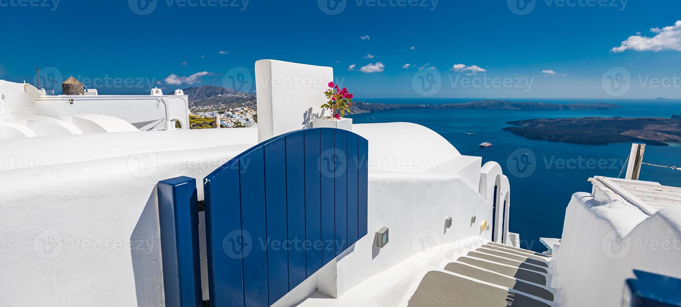 Santorini island panorama. Caldera view blue door, romantic street architecture , couple travel vacation landscape destination scenic. Tourism view, amazing sky sea Greece mood. Summer romance holiday photo