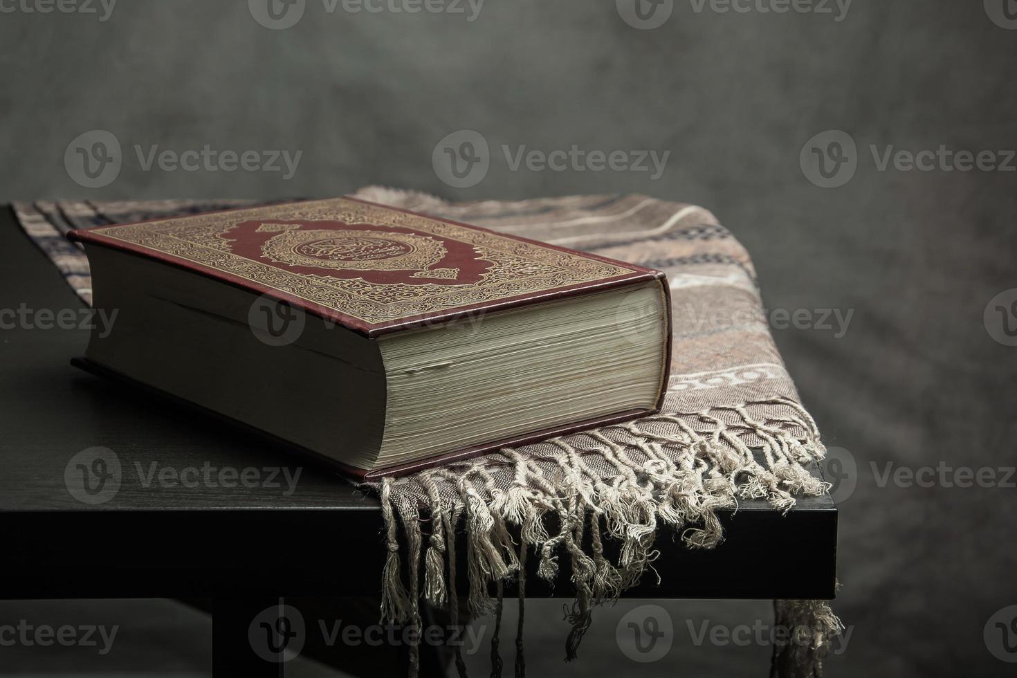 Koran holy book of Muslims  public item of all muslims  on the table , still life photo