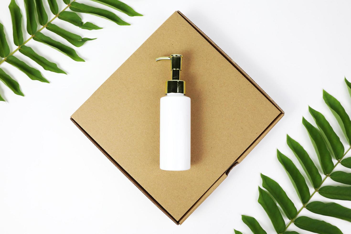 Bottle cosmetic for soap with box packaging photo