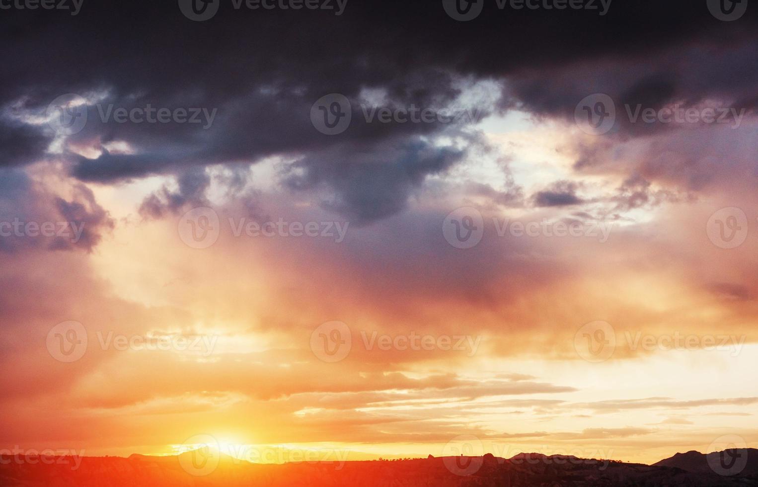 colorful sky with sun background in mountains. sunset, sunrise. photo