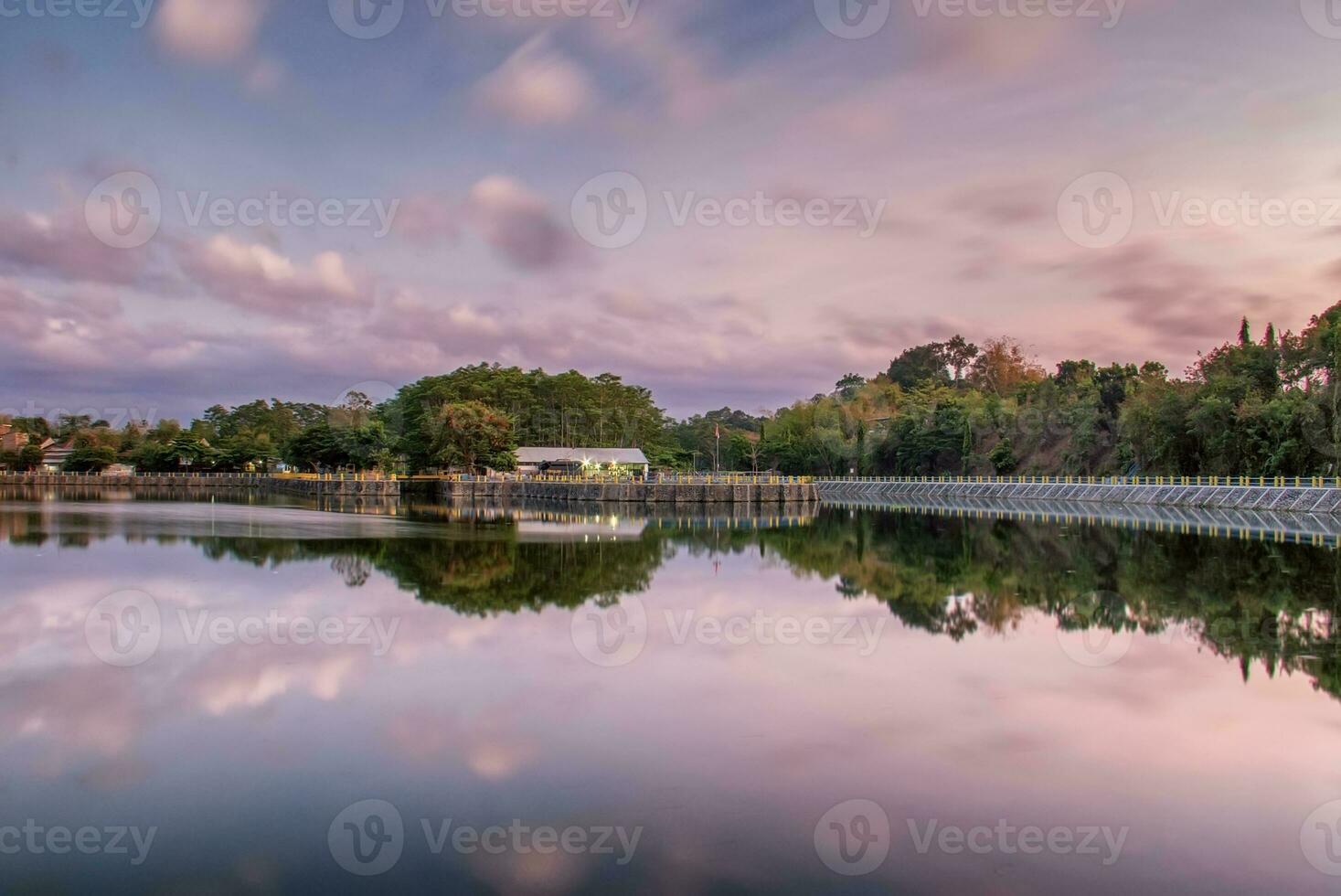 Reflection of the nature Tambakboyo Reservoir in the morning photo