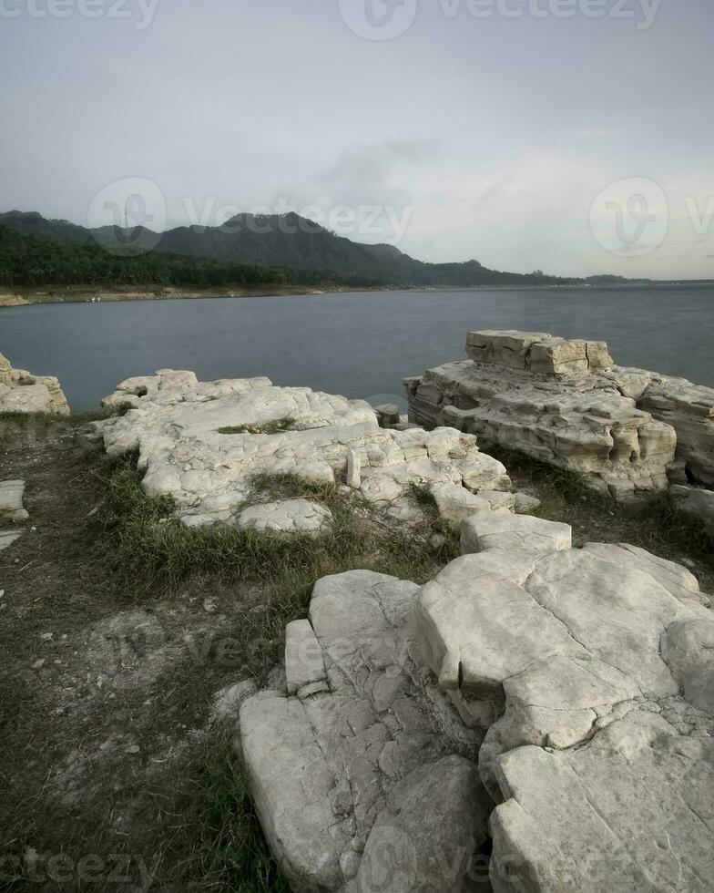 A view of a large pile of stones in Lubang Sewu Indonesia photo
