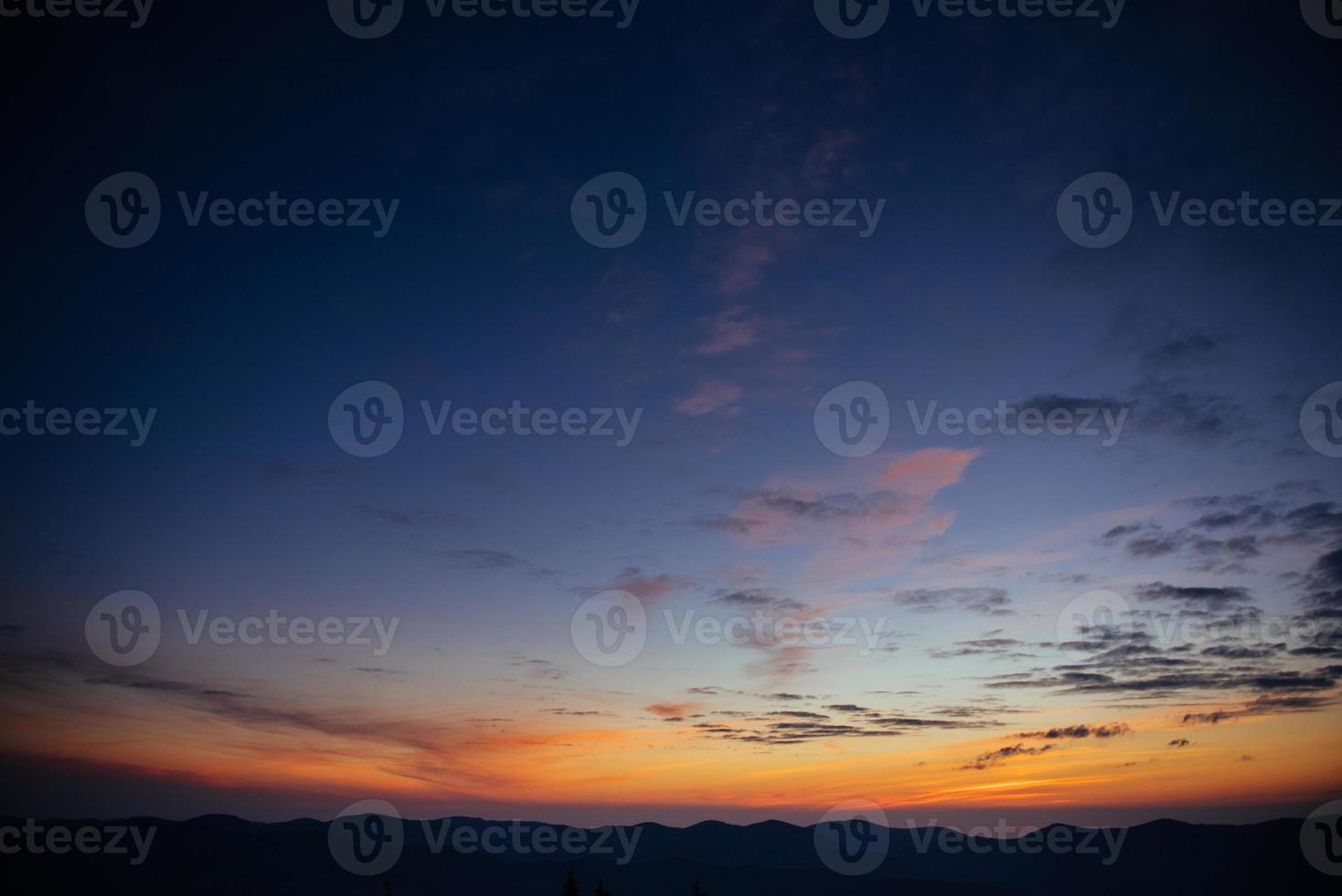 blue color of mountains during sunset. Carpathian, Ukraine photo