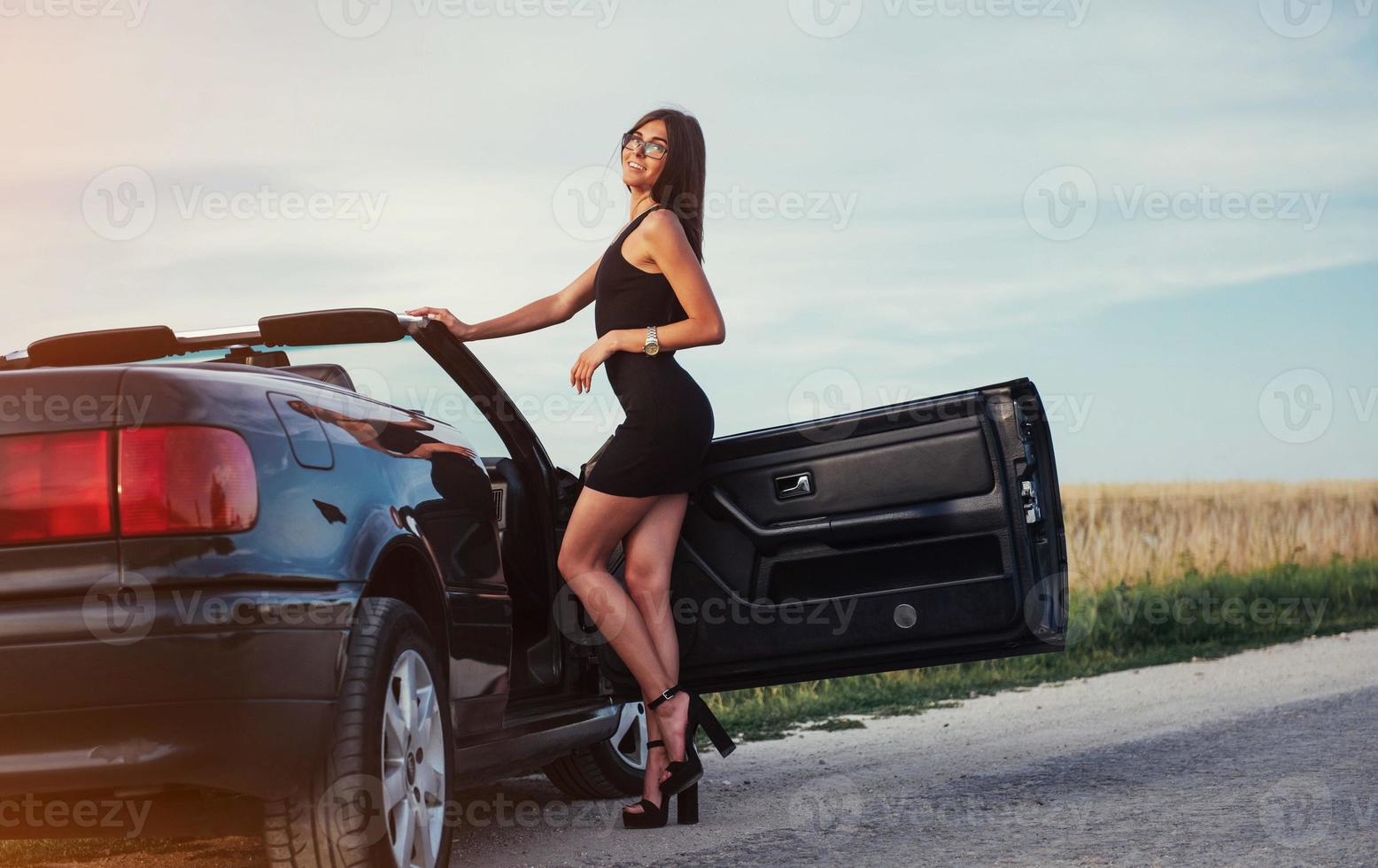 young woman in a photo shoot. She gladly posing