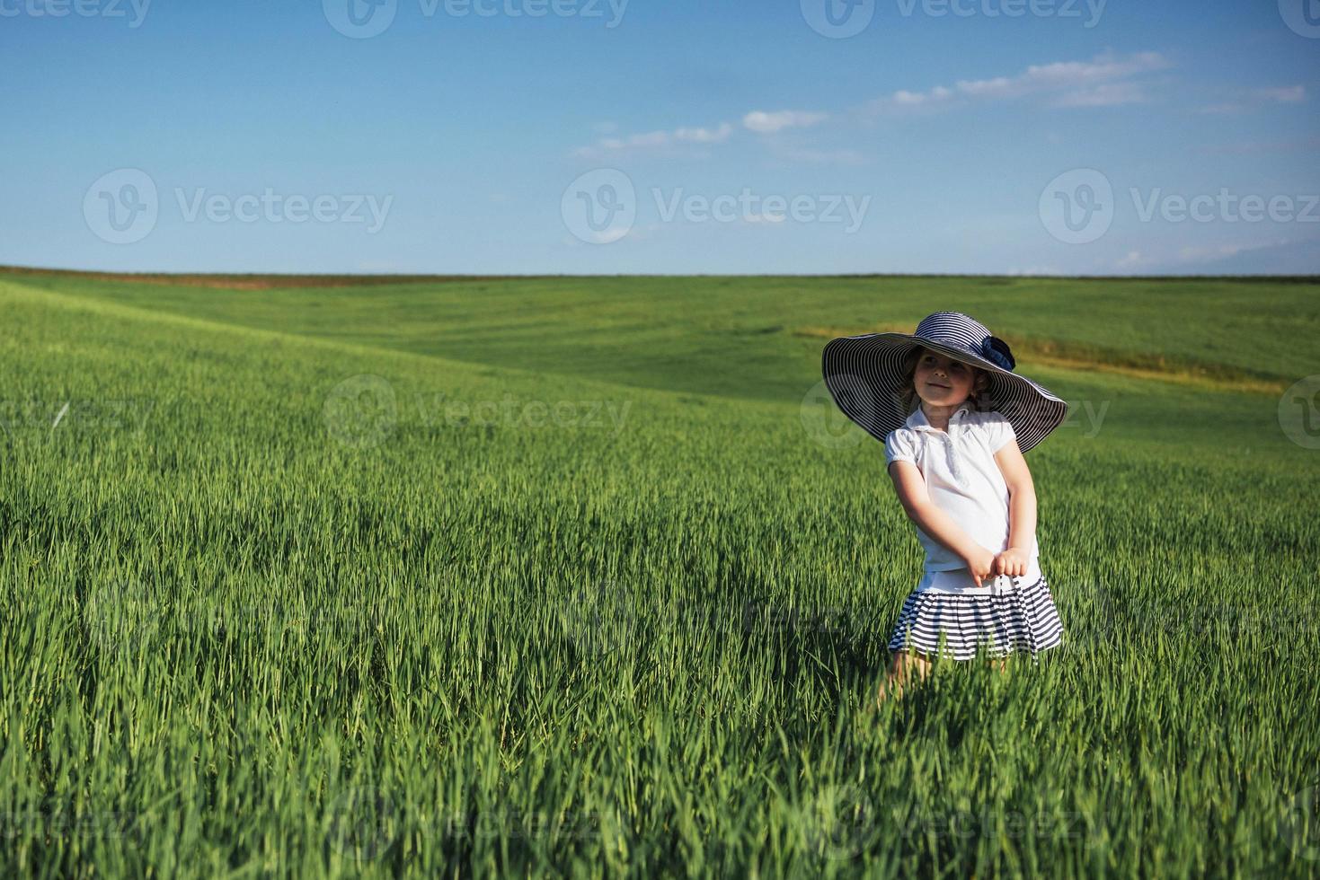 Child in a big hat photo