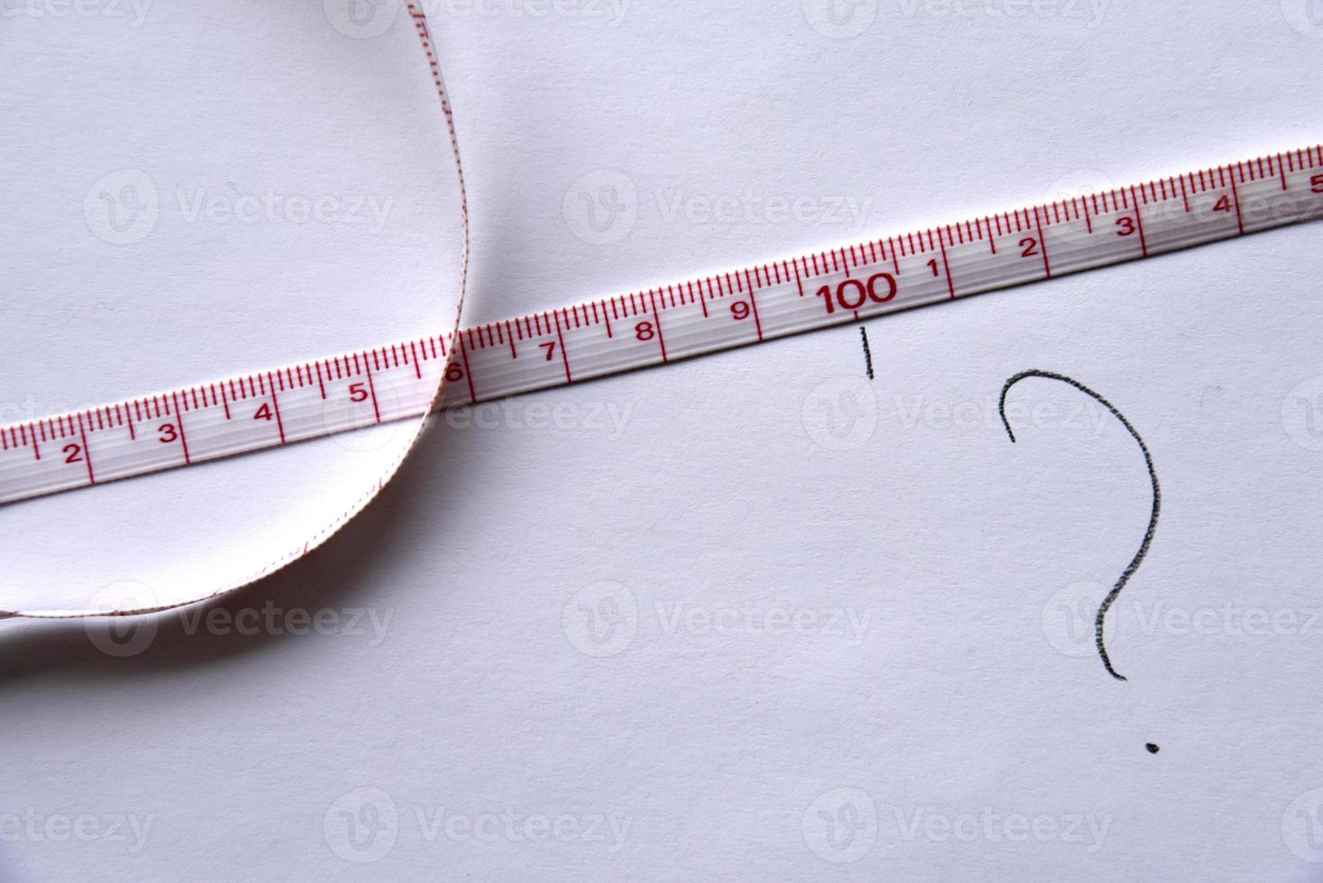 Sewing centimeter centimeter tape tailor's meter measuring tape on a white background photo