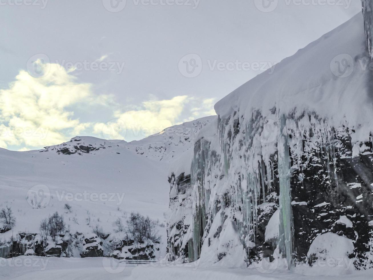 Frozen waterfall and icicles, beautiful landscape in Norway. photo