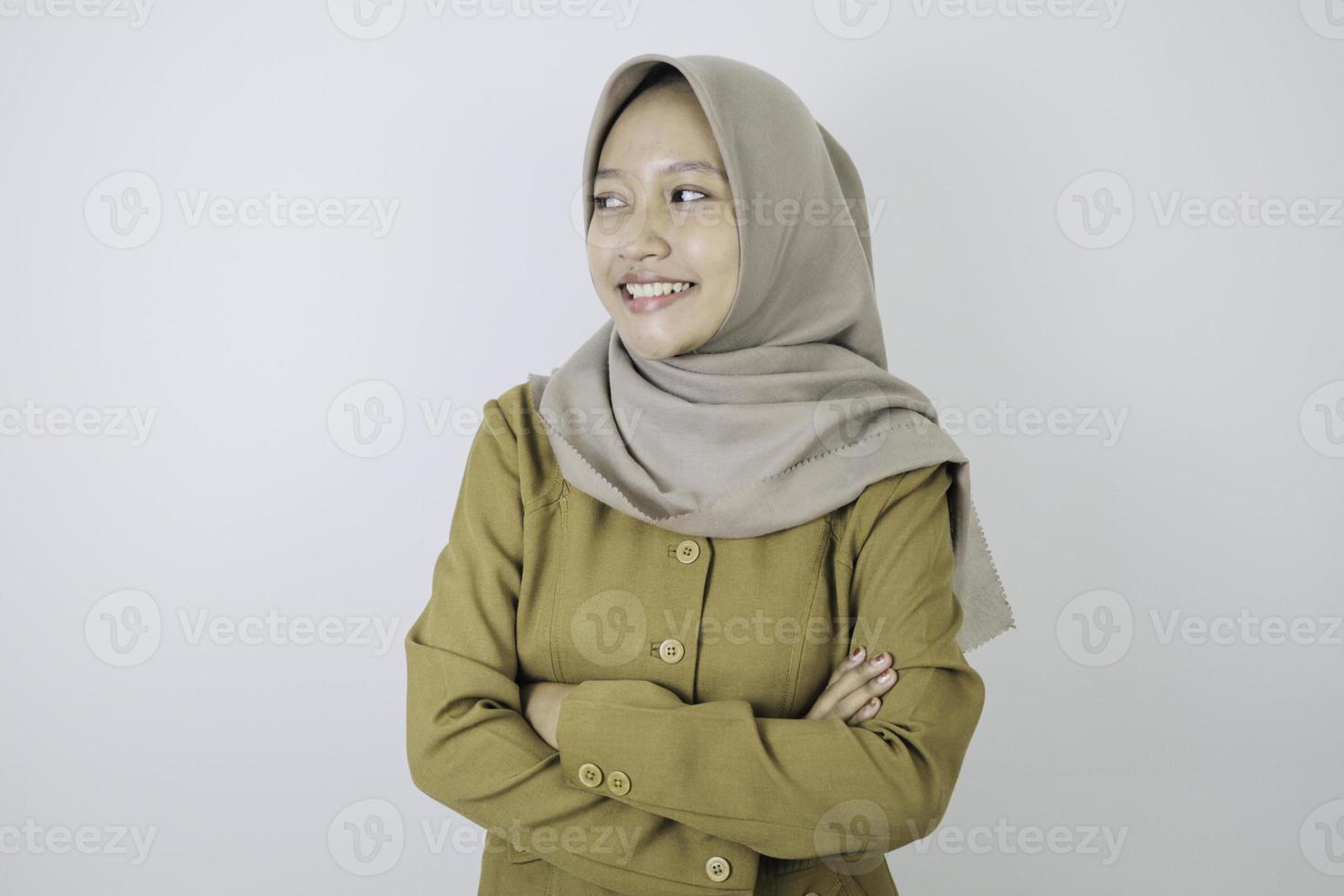 Happy government worker women standing confidance. PNS wearing khaki uniform. photo