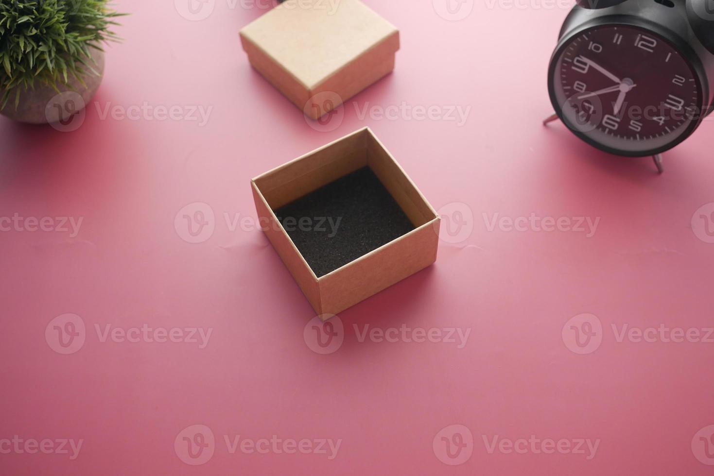 top view of person open a empty small gift box photo