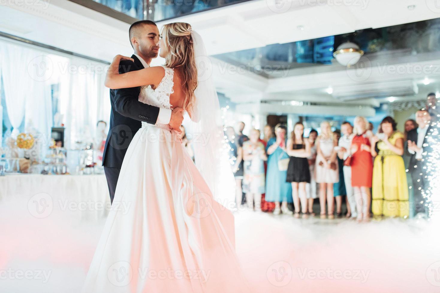 Happy bride and groom their first dance photo