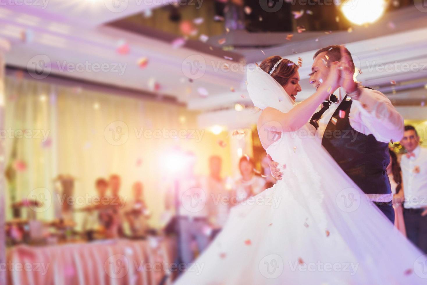 Happy bride and groom their first dance photo
