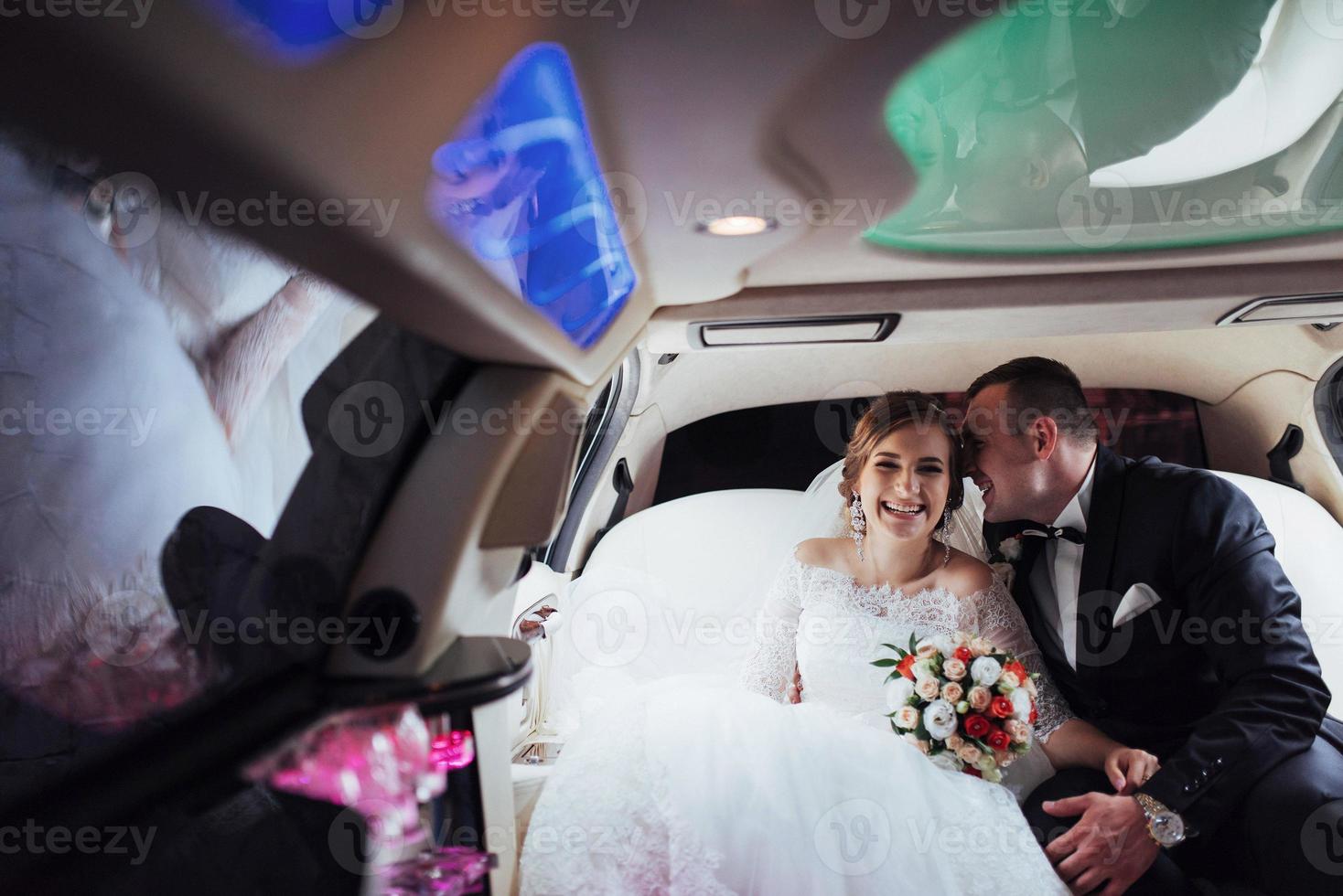 Happy man and woman smiling rejoicing in wedding day. photo