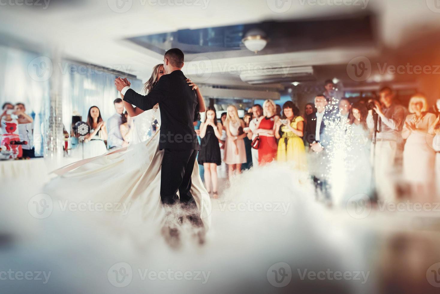 Happy bride and groom their first dance photo