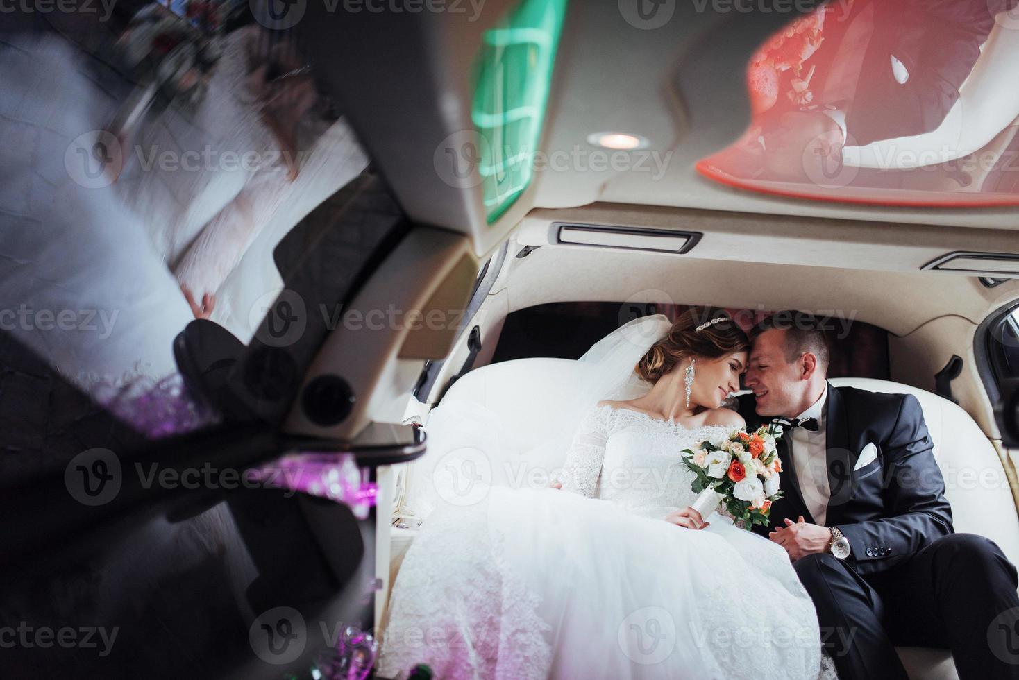 Happy man and woman smiling rejoicing in wedding day. photo