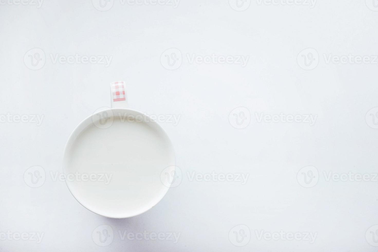 cup of milk on a white background photo