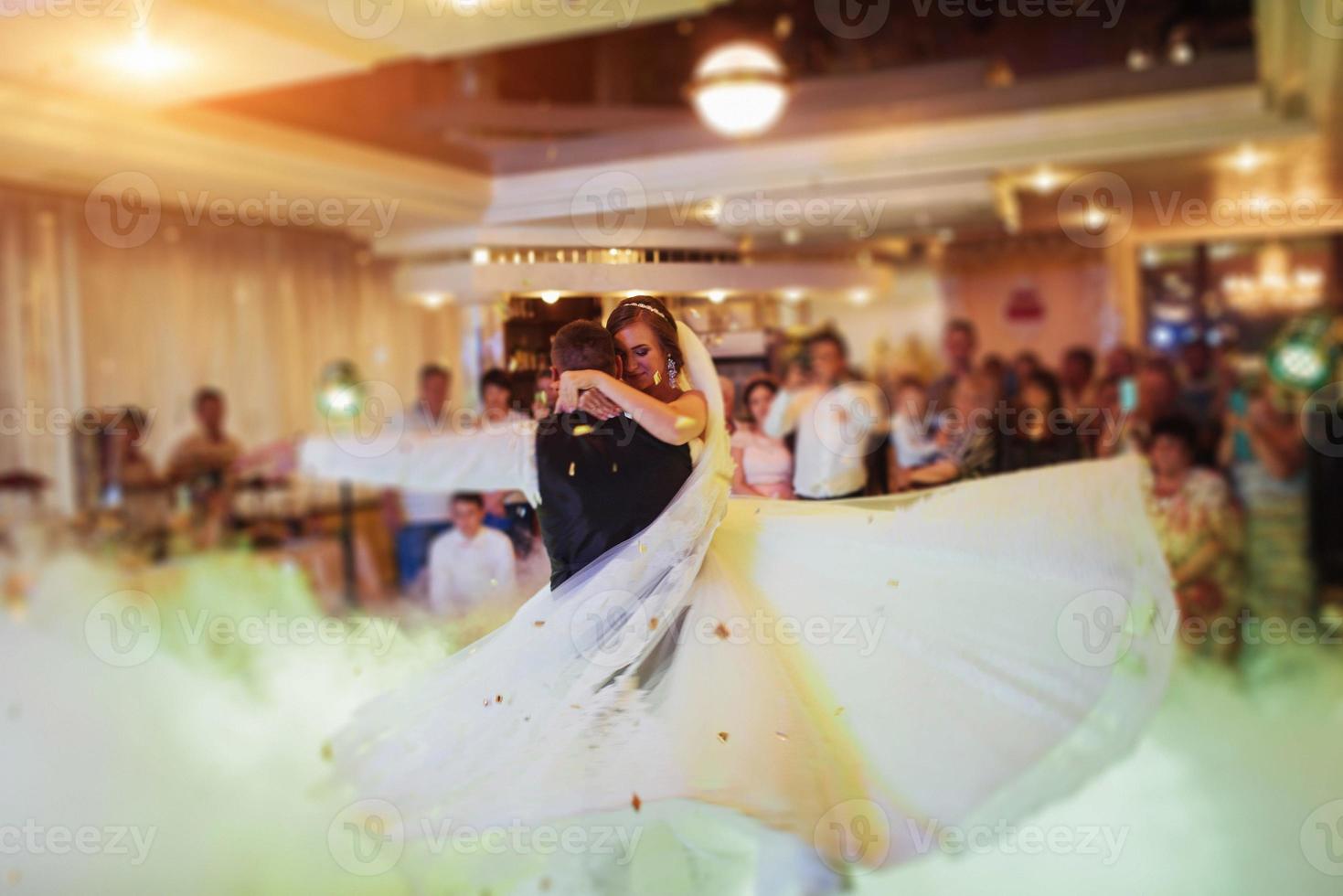 Happy bride and groom their first dance photo