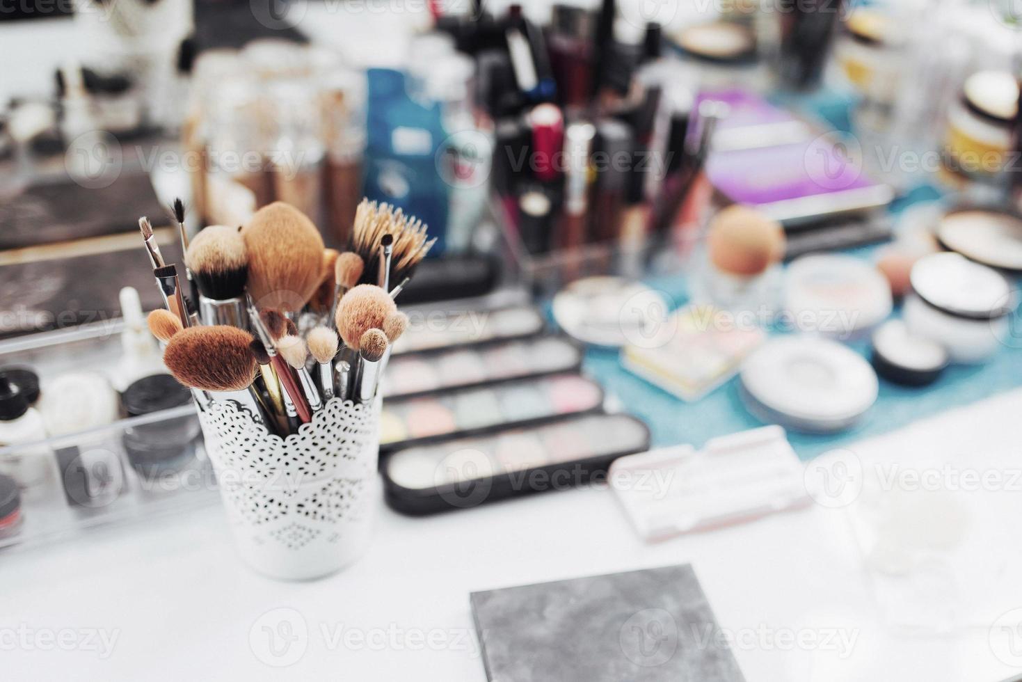 Colorful cosmetics in the workplace. top View photo